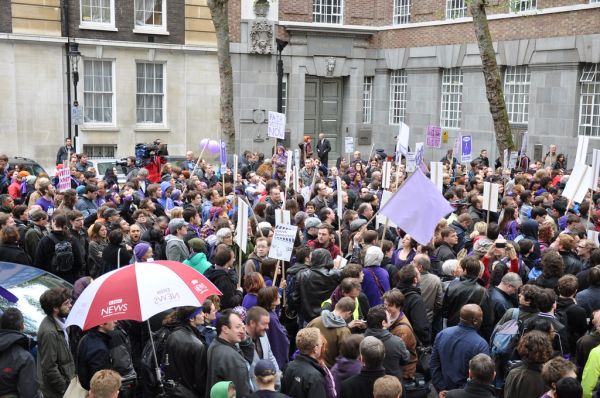 BBC News umbrella amidst the PR protesters