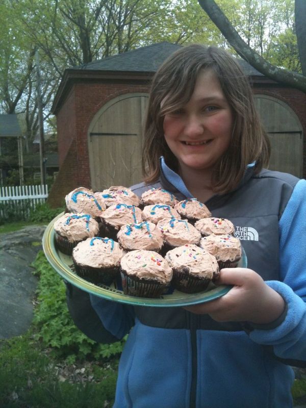 Birthday girl and cupcakes