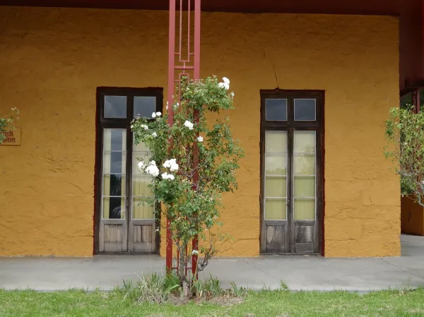 Norton Summit. Old Morialta House built for Sir John Baker 1847. Was Morialta orphanage 1924 to 1974. Now has been modernised with a new upper floor. Owned by Youth with a Mission training group. The French doors are original from 1847 but not much else.