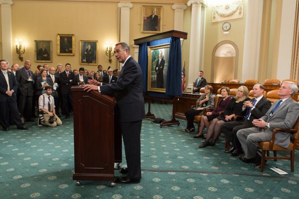 Speaker John Boehner accepts a portrait of outgoing Ways and Means Committee Chairman Dave Camp (R-MI) into the House collection. Camp has served as Chairman since 2011.