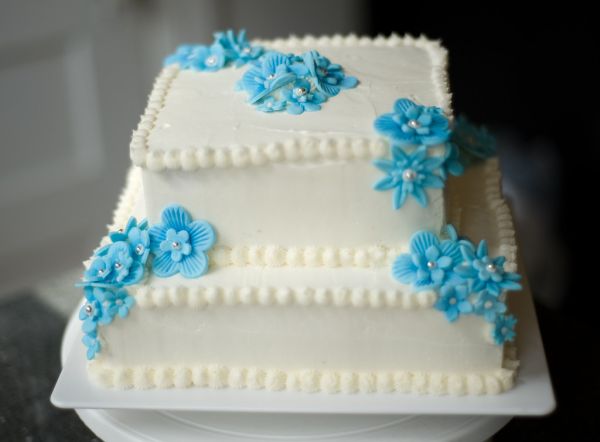 Springtime Birthday Cake (Almond sour cream pound cake with raspberry filling and buttercream)