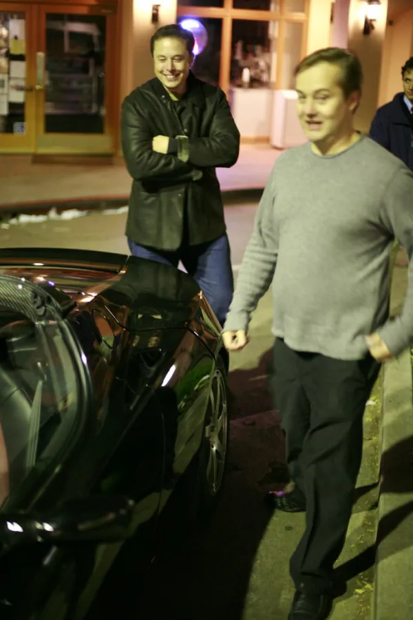 Elon Musk, investor in Tesla (left)