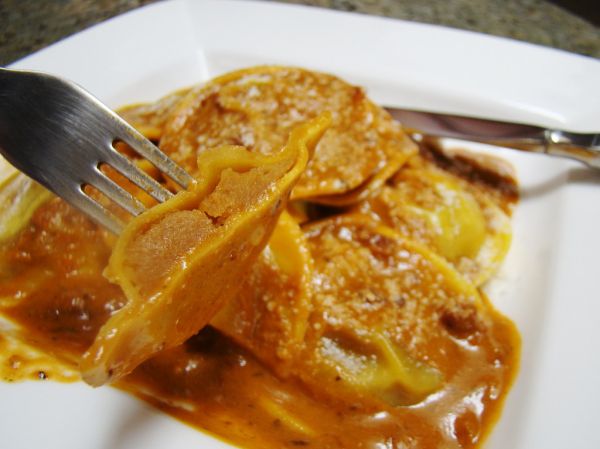 Sage Scented Butternut Squash Ravioli with Creamy Sun Dried Tomato Sauce