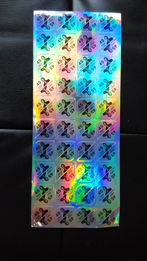 4S 'authenticity sticker' featuring Steve Jobs