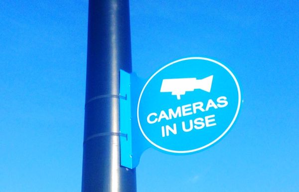 Surveillance Cameras in Use, NSA Spy Spying Security Camera Signs. Pics by Mike Mozart of TheToyChannel and JeepersMedia on YouTube. Spy Cams in use signs.