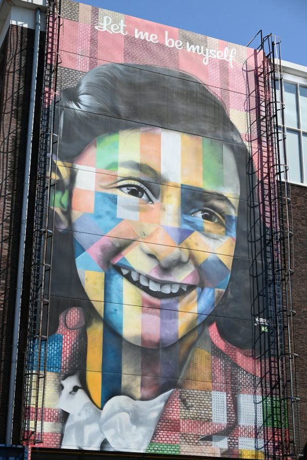 The Anne Frank mural outside the Straat Museum for Street Art and Graffiti - Amsterdam, Netherlands