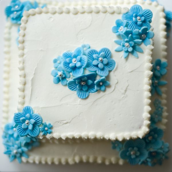 Springtime Birthday Cake (Almond sour cream pound cake with raspberry filling and buttercream)