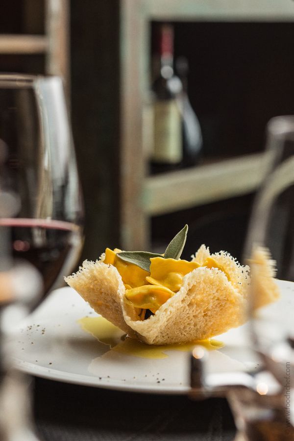 Agnolotti del “Plin” al Casteflmagno with Butter and Sage Sauce in a Crispy Parmesan Basket