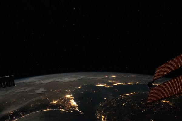 The well-lit United Arab Emirates with Qatar and Bahrain