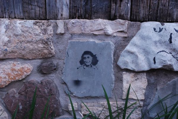 Anne Frank stencil outside Stubb's