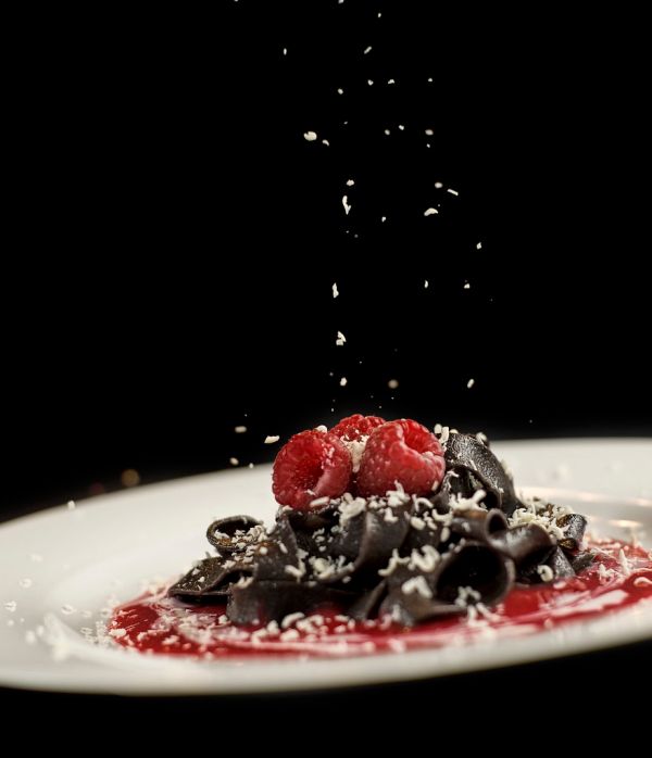Chocolate Pasta with Raspberry Coulis and Grated White Chocolate