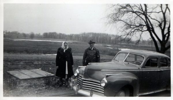Vintage - Elderly Couple & Car (1941 Chrysler)