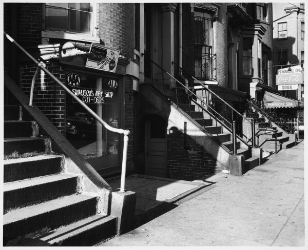 Symbols - Daytime, Key - Locksmith, Swanson's Key Shop between Staircases on Tremont Street, AAA and ALA Signs in Window