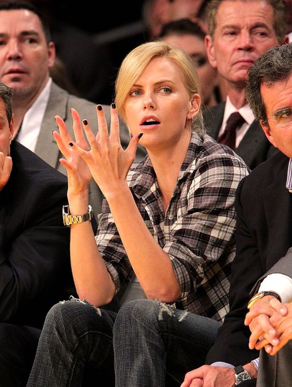Charlize-Theron-Rolex-DEEP-SEA-Lakers-Game-Clapping
