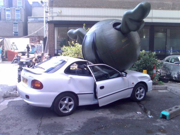 Car squashed by a wingèd bomb