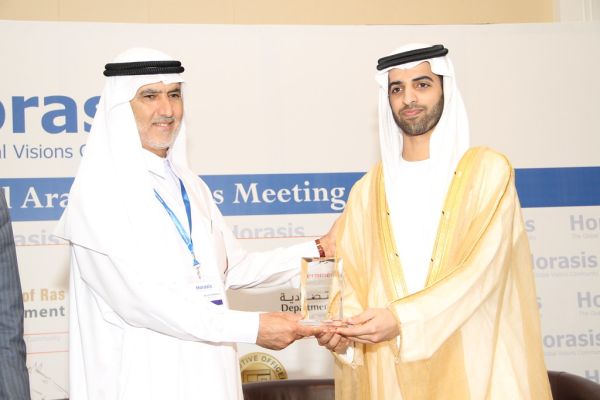 Ahmad Abdullah Ali Al Amash Tunaiji, General Manager, Gulf Cement Company, UAE, congratulated by Sheikh Mohammed, at the 2011 Horasis Global Arab Business Meeting