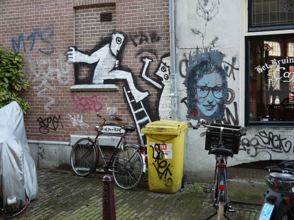 'Anne Frank portrait, in urban wall-painting on the corner Anjelierstraat and the canal Prinsengracht - Jordaan district Amsterdam, November 2013; photo Amsterdam city; Dutch photographer Fons Heijnsbroek, 2013