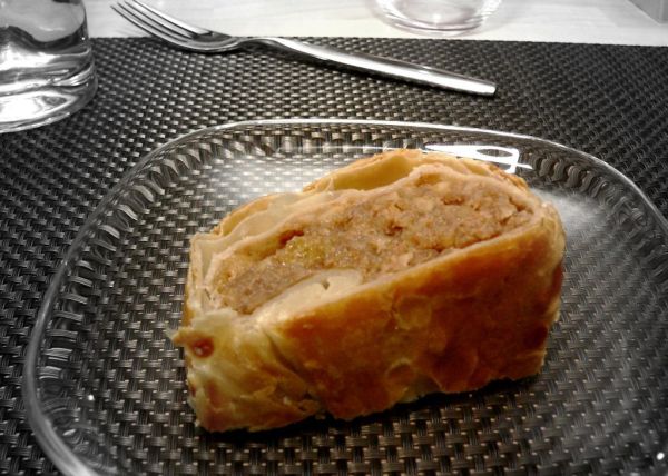 Pastry with walnuts, raisins, honey, and sponge cake