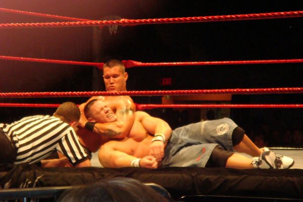 Randy Orton taking down the 'WWE Champion' John Cena