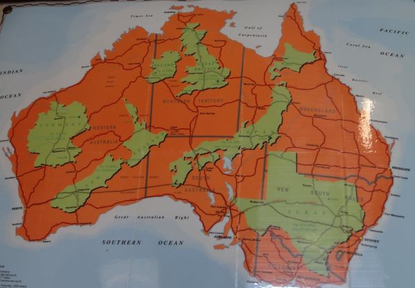 Australia map with New Zealand Germany Texas etc. In Charleville Royal Flying Doctor Service Office.