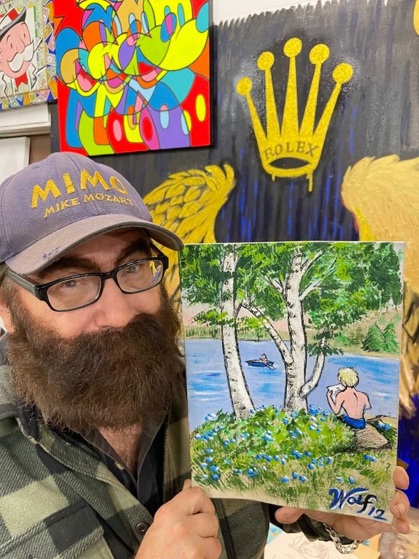 Self Portrait of MiMo, Mike Mozart at age 12 in Maine seated by Swan Lake, Swanville Maine, in front of my Grandmother’s Cabin. Signed Wolf 12, short for Wolfgang Mikyáll Mozart!